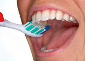 Brush the outer tooth surfaces, keeping the toothbrush at a 45-degree angle to the gums.
