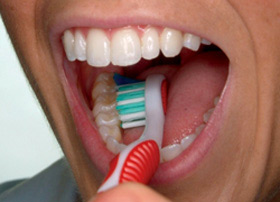 Brush the inner tooth surfaces, still with the toothbrush at a 45-degree angle.
